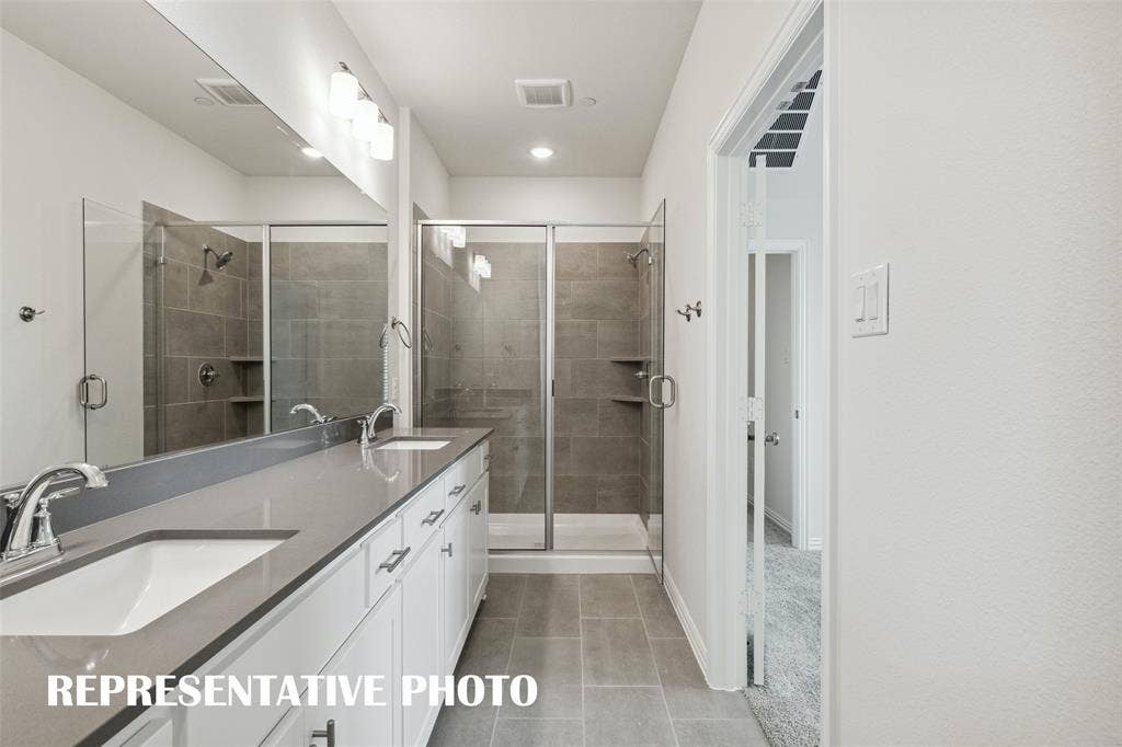 3725 Pierce Lane, Grand Prairie, TX 75052 Your new owner's bath features a double vanity offering plenty of space for two! REPRESENTATIVE PHOTO