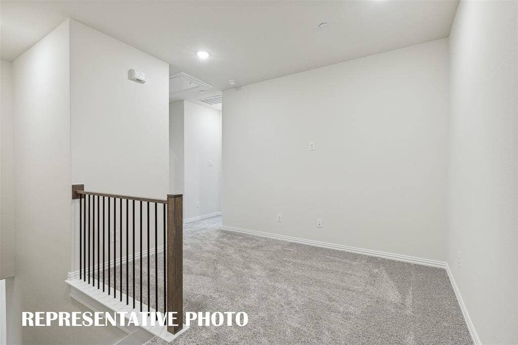 3725 Pierce Lane, Grand Prairie, TX 75052 Upstairs features a loft area perfect for a home office or a place to curl up with a good book. REPRESENTATIVE PHOTO