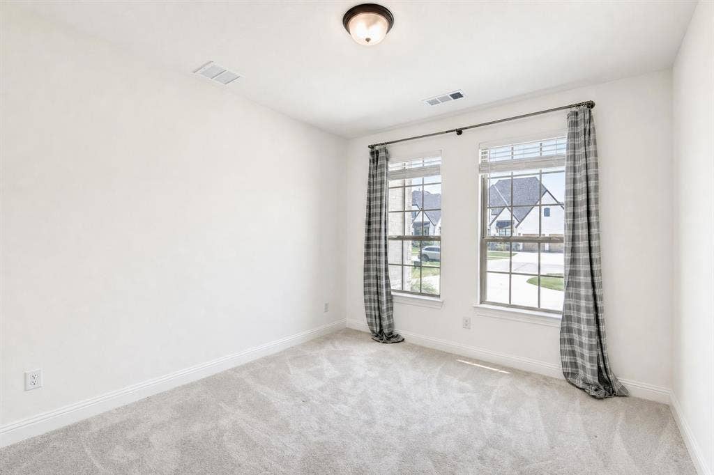 304 Cottontail Lane, Northlake, TX 76247 Bedroom #2 is located downstairs.