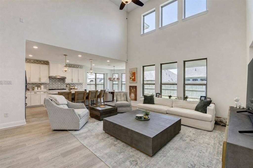 304 Cottontail Lane, Northlake, TX 76247 This home offers a bright, open floor plan, soaring ceilings and abundant natural light.