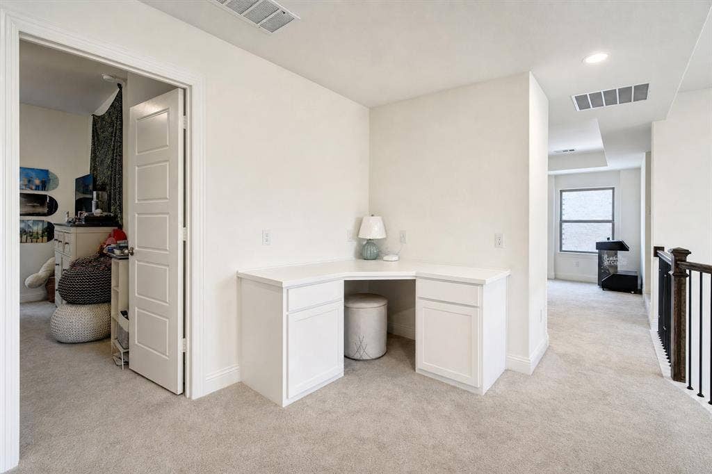 304 Cottontail Lane, Northlake, TX 76247 A study nook with built-in desk is just outside the upstairs bedrooms.