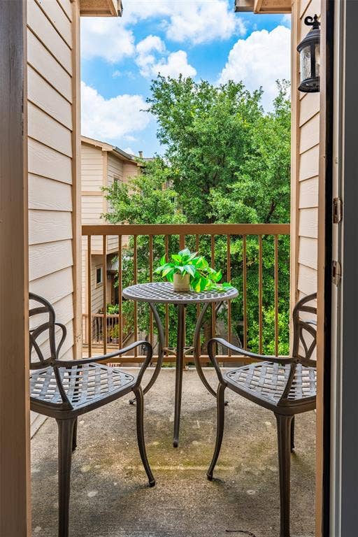 4830 Cedar Springs Road, #30, Dallas, TX 75219 Private balcony featuring a concrete surface and metal railing