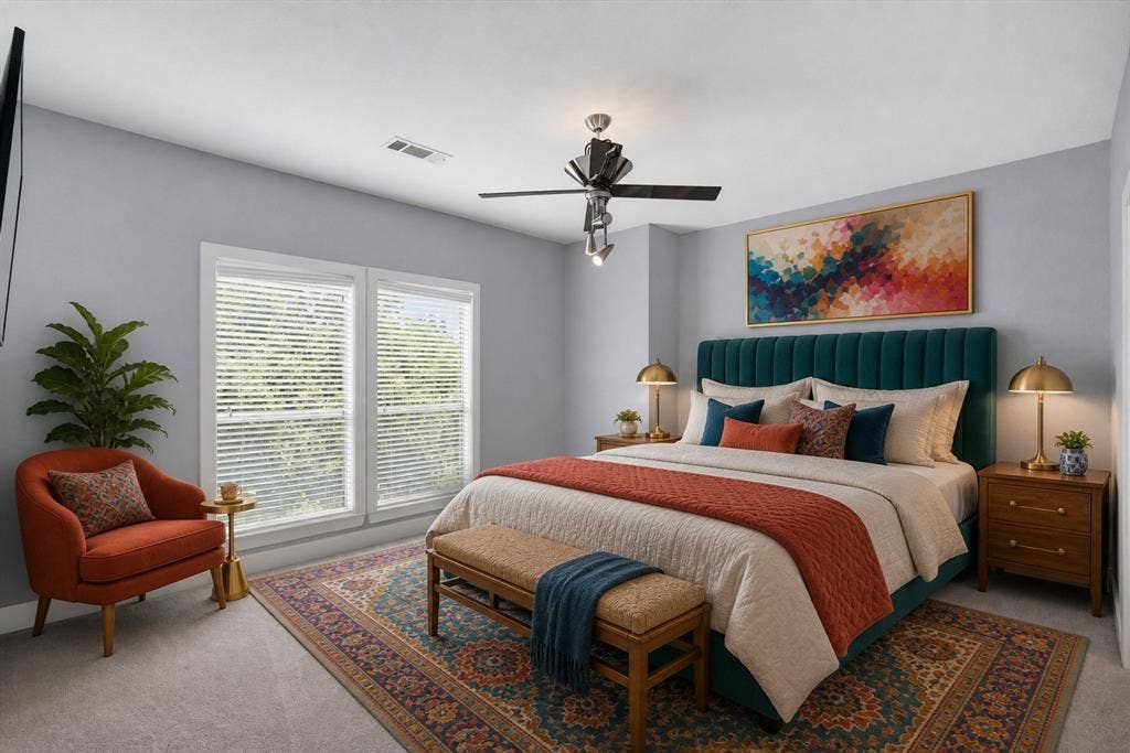 4830 Cedar Springs Road, #30, Dallas, TX 75219 Primary Bedroom with Teal Upholstered Headboard, Ceiling Fan with Integrated Lighting, Large Glass Doors with Plantation Shutters, Hardwood Nightstands, and Patterned Area Rug Anchoring the Space