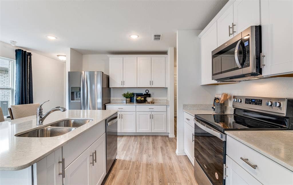 2104 Sugar Maple Lane, Forney, TX 75126 *Model Representation - Abundant cabinet space in kitchen