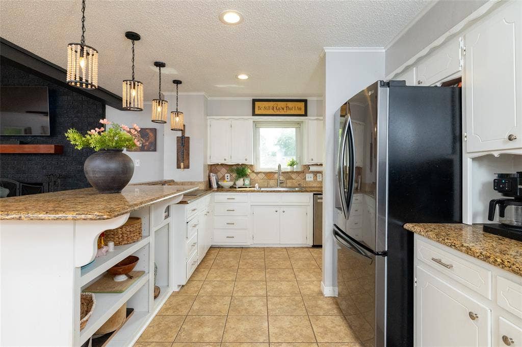 205 Timberlake Drive, Azle, TX 76020 The heart of your home