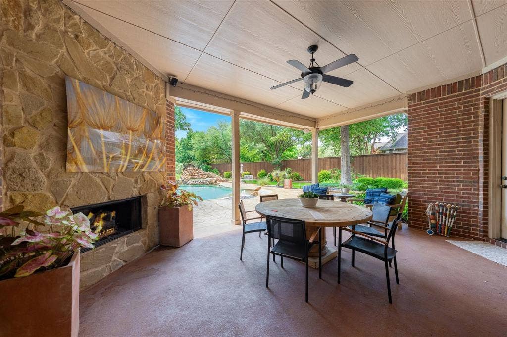Covered patio with fireplace
