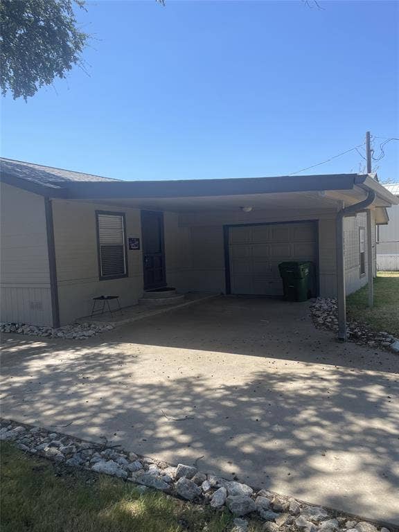 3804 Sandy Beach Drive, Granbury, TX 76049 carport and garage