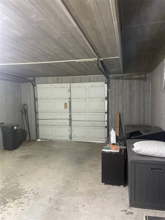 3804 Sandy Beach Drive, Granbury, TX 76049 inside garage, finished with paneling
