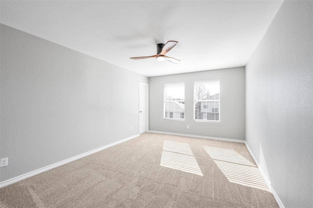 1123 Caroline Drive, Princeton, TX 75407 Upstairs Bedroom #4 with walk in closet, new carpet and ceiling fan