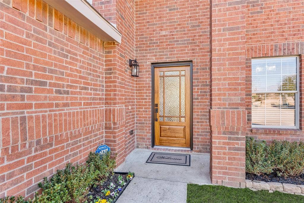 1123 Caroline Drive, Princeton, TX 75407 New front door and inviting entrance