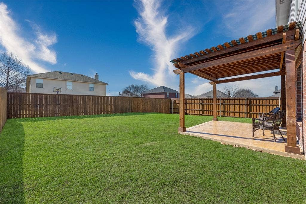 1123 Caroline Drive, Princeton, TX 75407 Privacy Fence recently stained