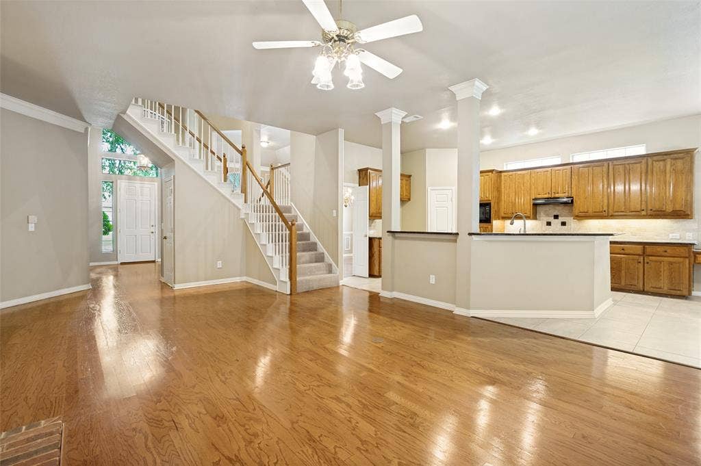 2820 Creek Bend, McKinney, TX 75072 The open concept includes the foyer that leads into the family room and kitchen with a breakfast dining area.