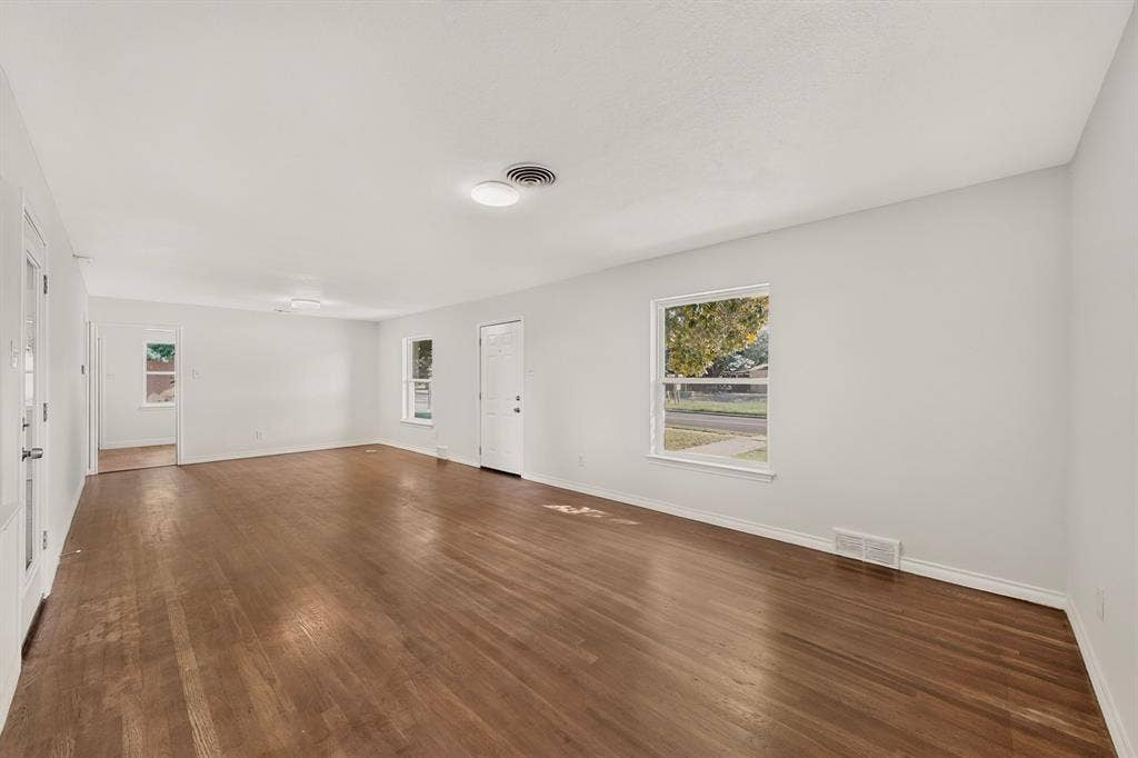 405 Easton Road, Dallas, TX 75218 Living room open to dinning room