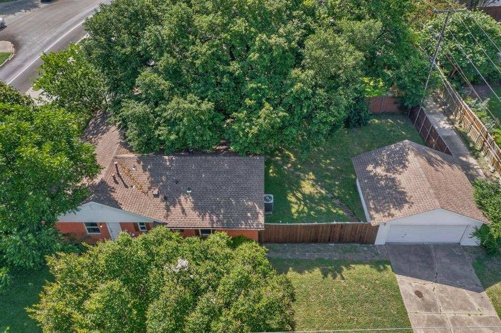 405 Easton Road, Dallas, TX 75218 Aerial perspective showcasing the residential property