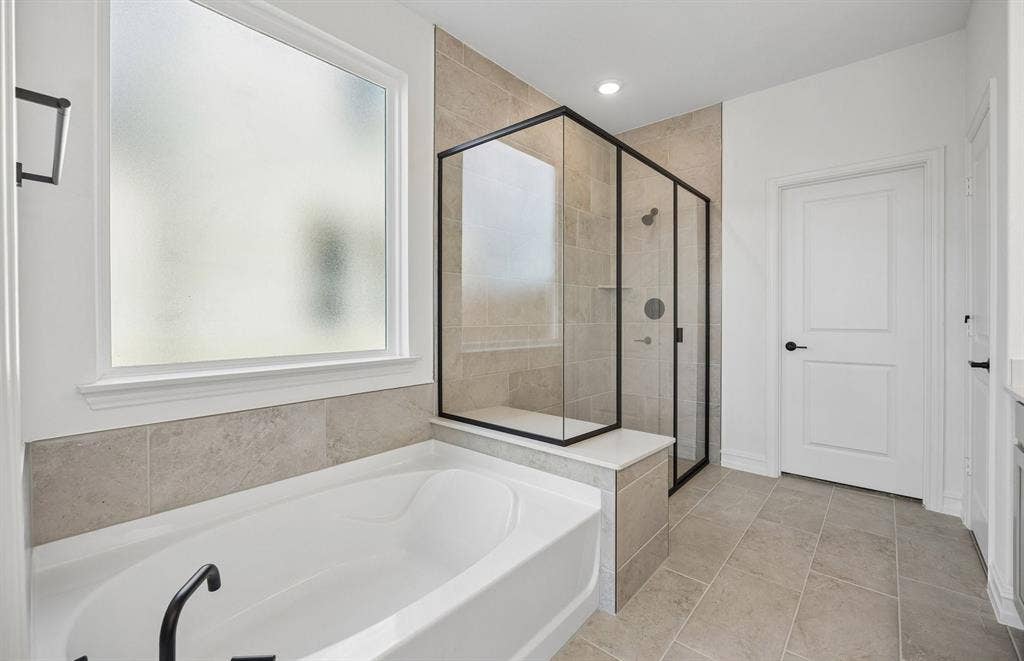 4145 Gonzales Drive, McKinney, TX 75071 Separate tub and shower in primary bath