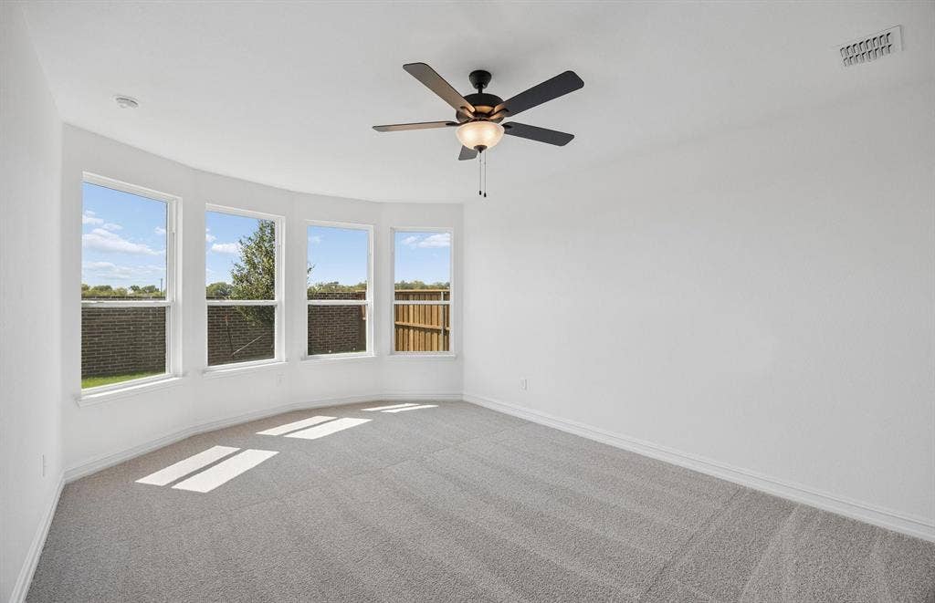 4145 Gonzales Drive, McKinney, TX 75071 Primary bedroom with bay windows