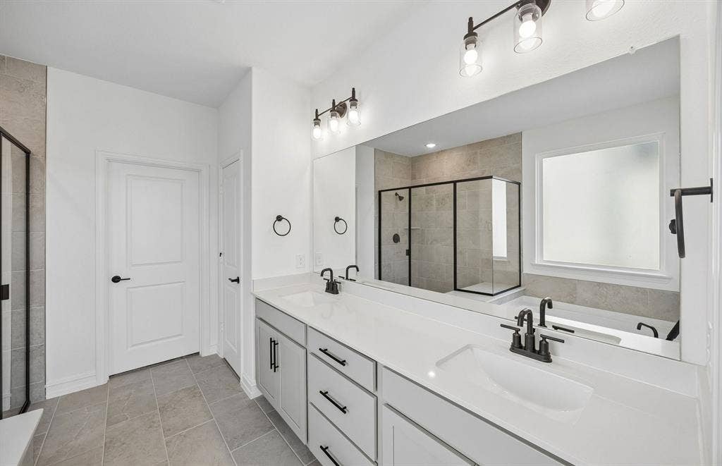 4145 Gonzales Drive, McKinney, TX 75071 Primary bath with double vanity