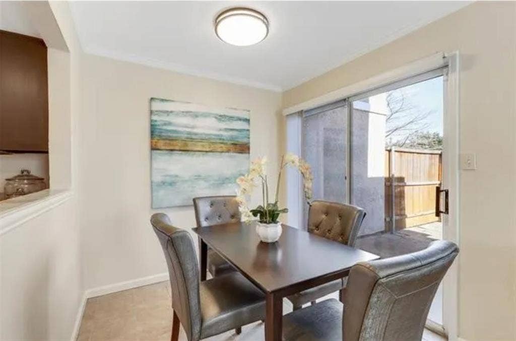8400 Hickory Street, #1504, Frisco, TX 75034 Dining area with neutral wall paint, white crown molding, and recessed lighting