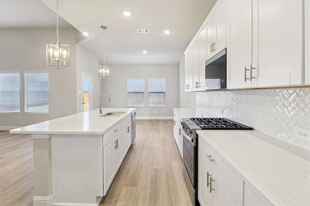 1311 Winters Way, Princeton, TX 75071 Photo is not of the actual home, but is an inspirational photo of builder’s model home and may depict options, furnishings, and/or decorator features that are not included.