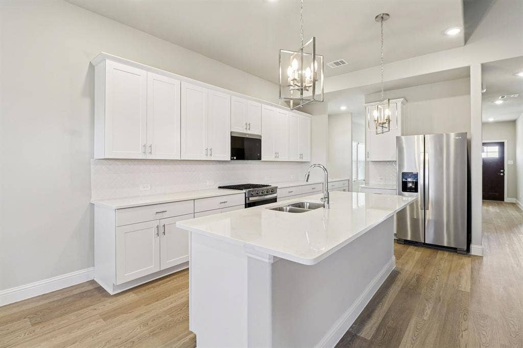 1311 Winters Way, Princeton, TX 75071 Photo is not of the actual home, but is an inspirational photo of builder’s model home and may depict options, furnishings, and/or decorator features that are not included.