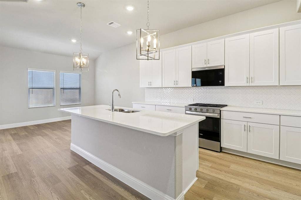 1311 Winters Way, Princeton, TX 75071 Photo is not of the actual home, but is an inspirational photo of builder’s model home and may depict options, furnishings, and/or decorator features that are not included.
