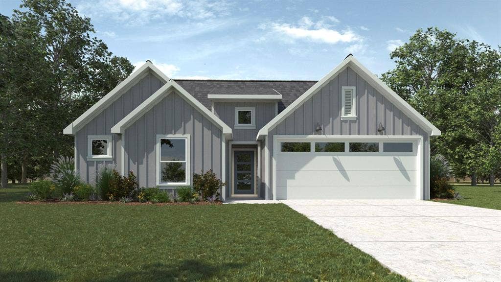 Contemporary board and batten siding exterior with a dark shingle roof