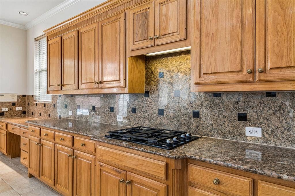 3809 Brookfield Drive, Plano, TX 75025 With generous countertops throughout, this home is a dream for the baking enthusiast in the family. Imagine the joy of rolling out an abundance of cookie dough with friends or the little ones in your life, creating cherished moments in this fun and inviting space.