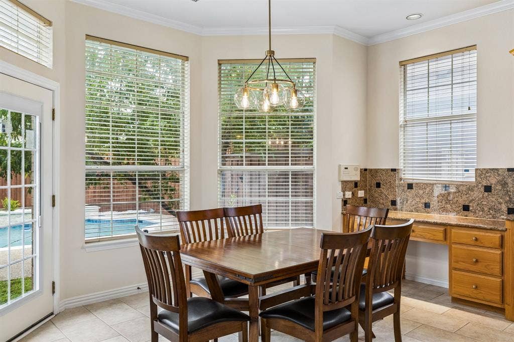 3809 Brookfield Drive, Plano, TX 75025 The large kitchen opens to the breakfast room and living room where the chef will still be able to enjoy and interact with family and friends while meals are being prepared for everyone. Here a window, there a window!