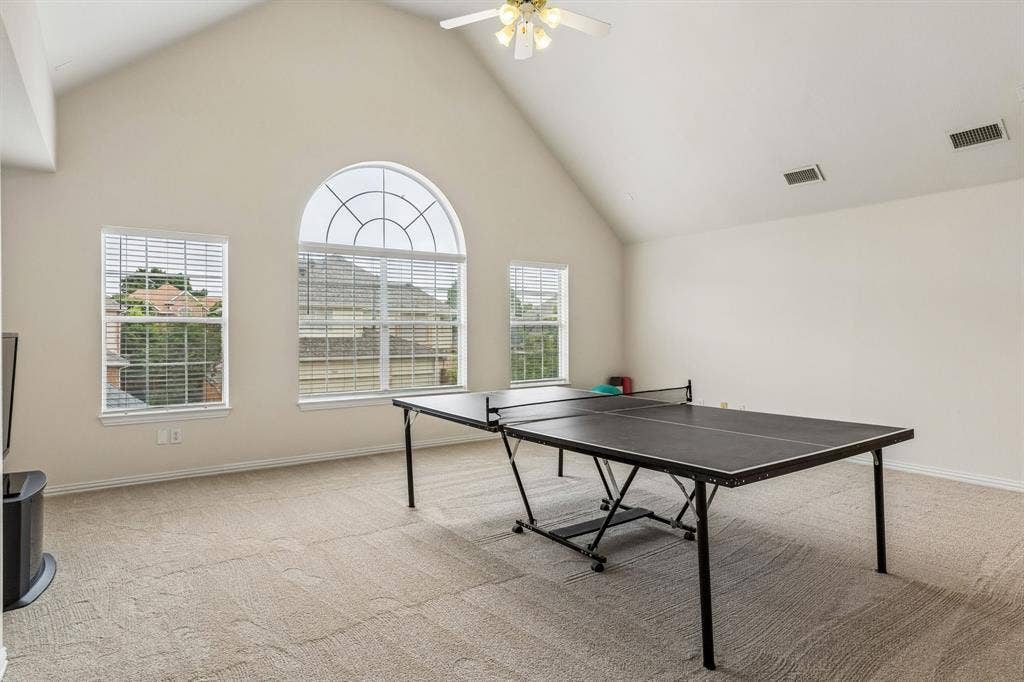 3809 Brookfield Drive, Plano, TX 75025 A true standout feature of the home, this expansive game room offers exceptional space and unlimited versatility. Large enough to accommodate multiple activity zones, it can effortlessly serve as a media room, billiards room, fitness area, home office, teen retreat, or entertainment hub. Whether hosting game nights, movie marathons, or creating the ultimate flex space, this oversized room is limited only by your imagination. Let the games begin!!