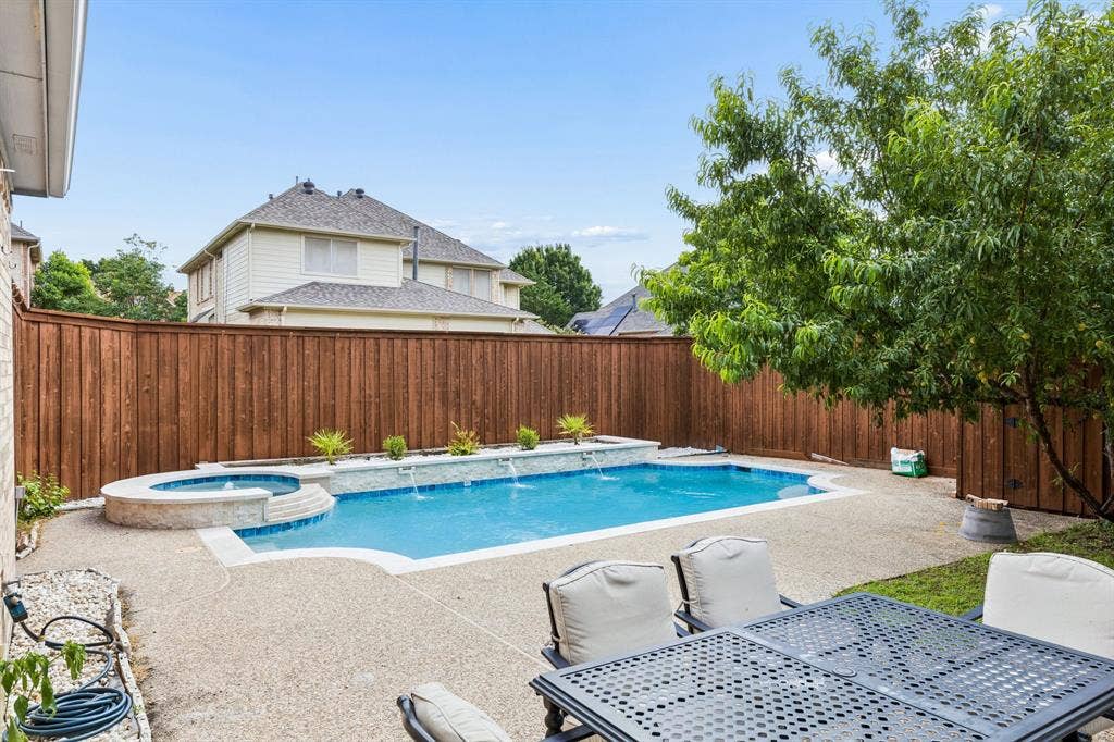 3809 Brookfield Drive, Plano, TX 75025 The sparkling pool creates the perfect setting for relaxing weekends, entertaining guests, and enjoying Texas summers in style.