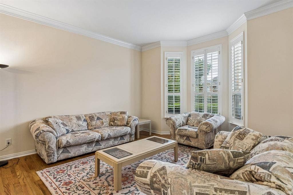 3809 Brookfield Drive, Plano, TX 75025 A large formal second living room to your right upon entering is perfect for entertaining or those quiet times when you'd like to read or scroll and be away from the busyness of others.