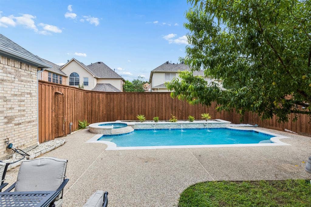 3809 Brookfield Drive, Plano, TX 75025 The sparkling pool creates the perfect setting for relaxing weekends, entertaining guests, and enjoying Texas summers in style.