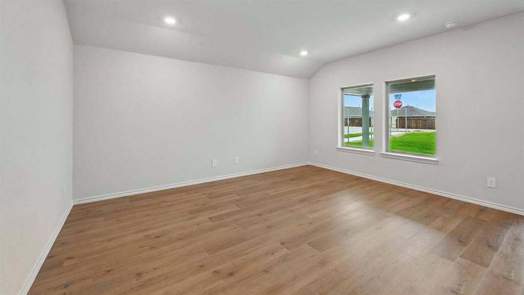5008 Shumard Drive, Lindale, TX 75771 Interior space featuring wood-finish flooring, white baseboards, and light-toned walls
