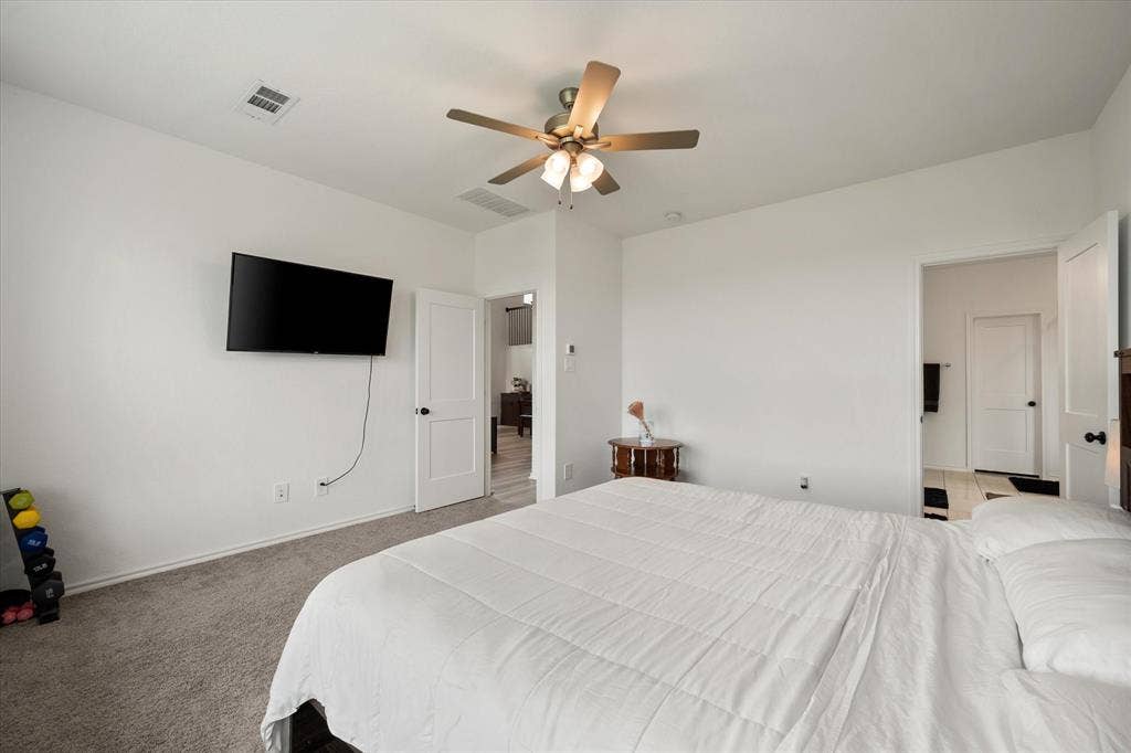 2325 Volans Drive, Haslet, TX 76052 Primary bedroom with ensuite bathroom