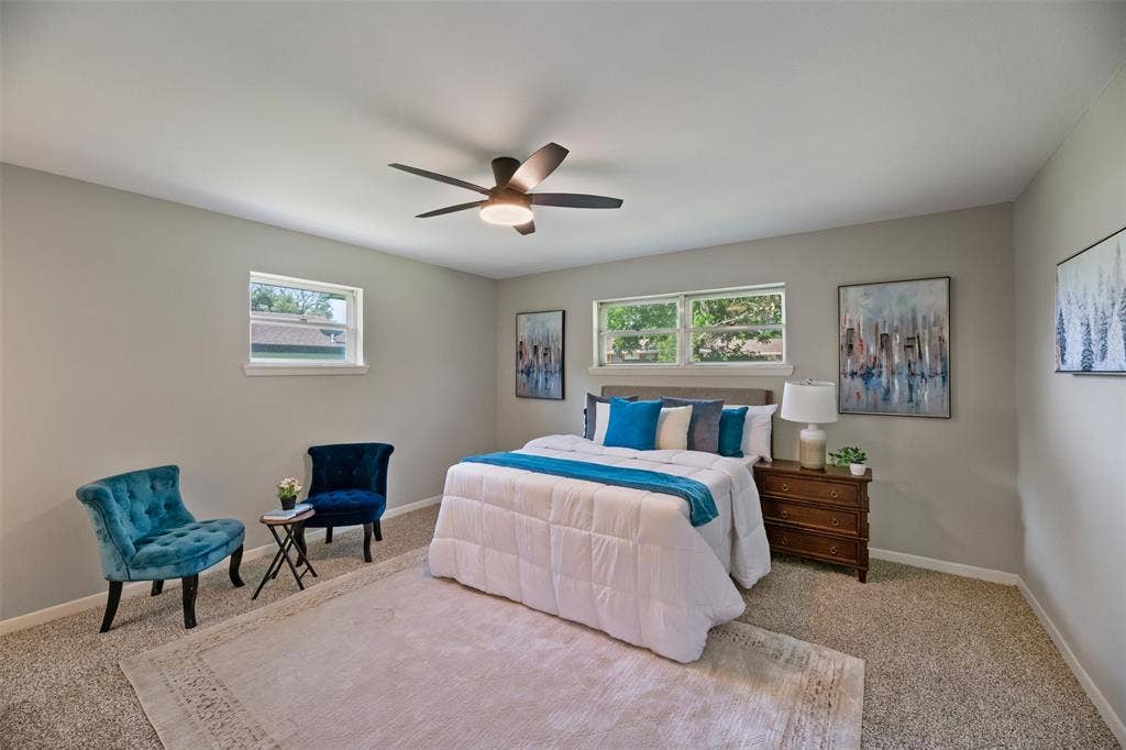 1138 Usher Street, Benbrook, TX 76126 Primary Bedroom. All bedrooms have new carpet and ceiling fans.