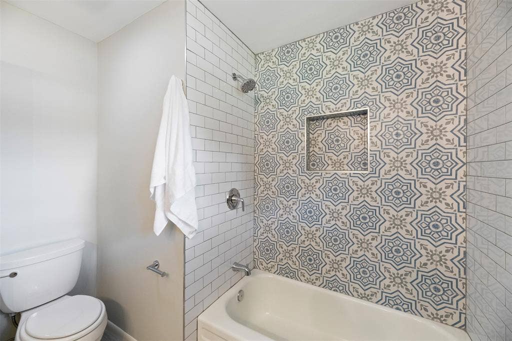 1138 Usher Street, Benbrook, TX 76126 Bathtub with new tile surround and faucet