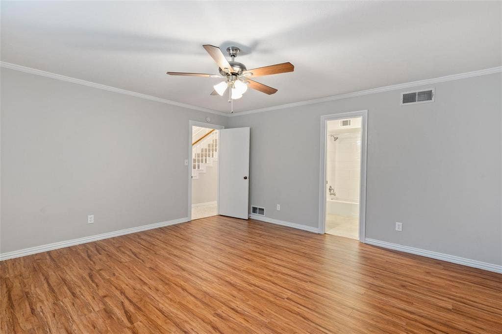 4355 Harvest Hill Road, Dallas, TX 75244 Large primary bedroom is on the first floor with an attached bathroom.