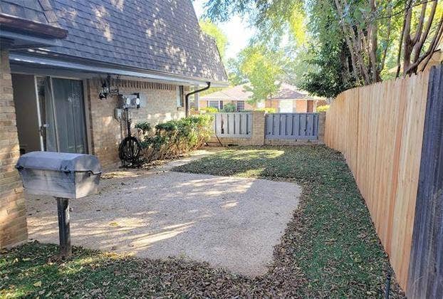 4355 Harvest Hill Road, Dallas, TX 75244 Faux grass in the side yard and BBQ grill.