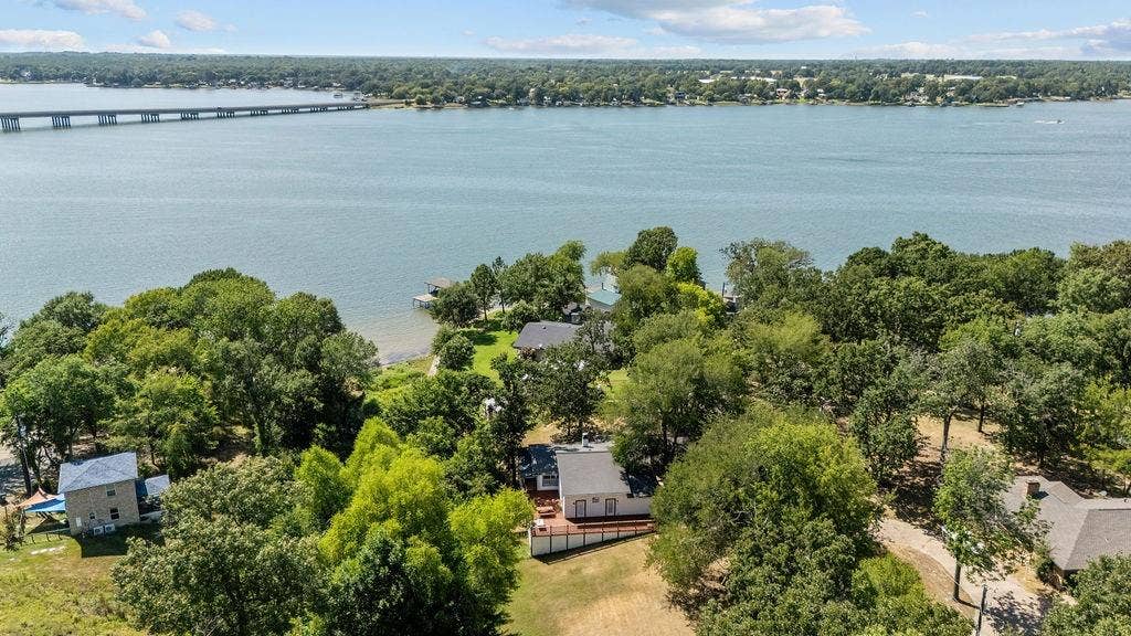 Waterfront property with mature tree coverage and a private boat dock