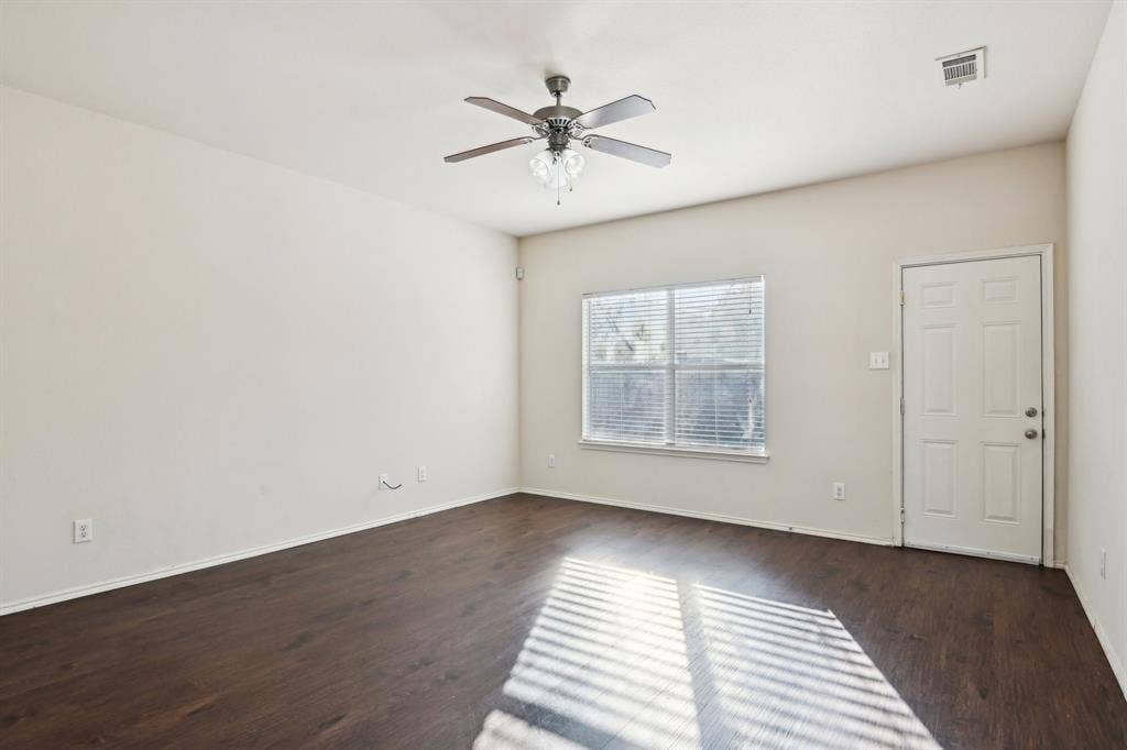 3019 Appaloosa Drive, Dallas, TX 75237 room featuring dark wood-type flooring and ceiling fan