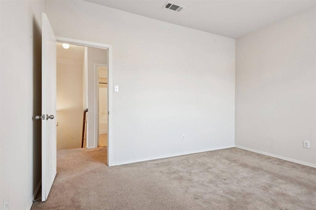 3019 Appaloosa Drive, Dallas, TX 75237 View of carpeted spare room