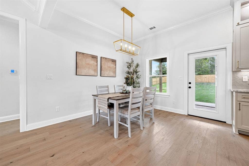 301 Grace Lane, Athens, TX 75751 Bright dining area with wood-finish flooring