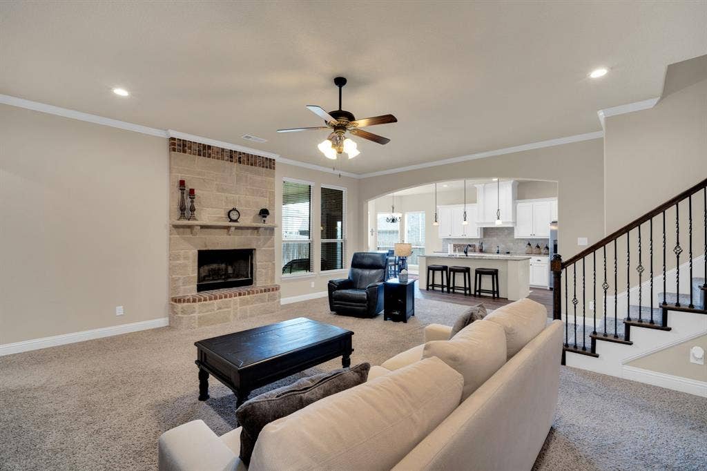 Spacious living room that encourages large gatherings for meals and entertaining.