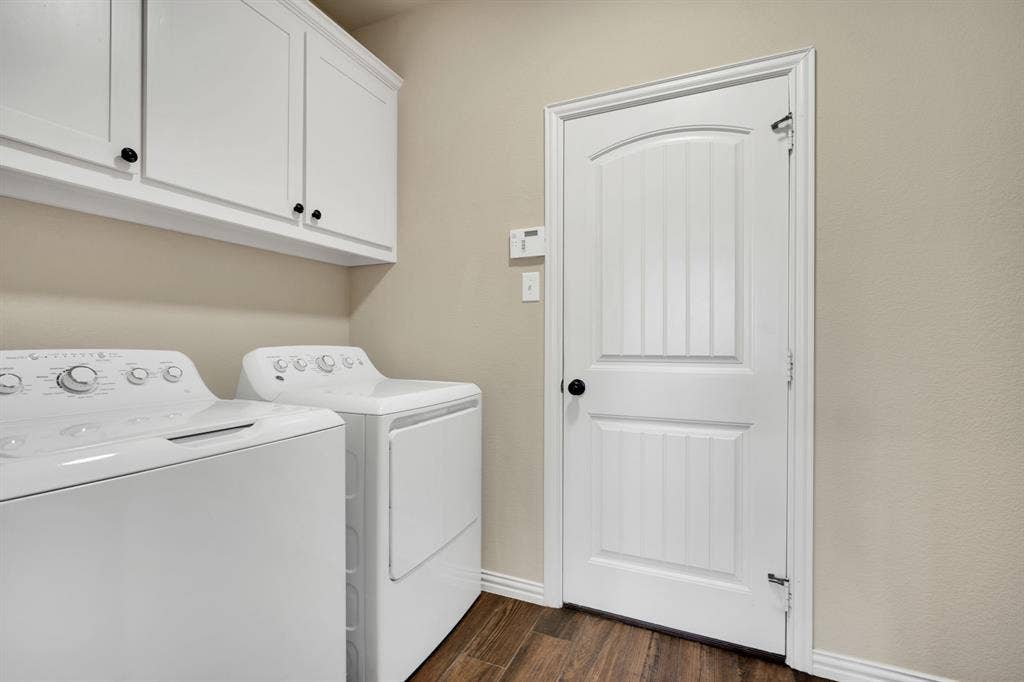 First floor utility room. Access it from the kitchen or from the garage.