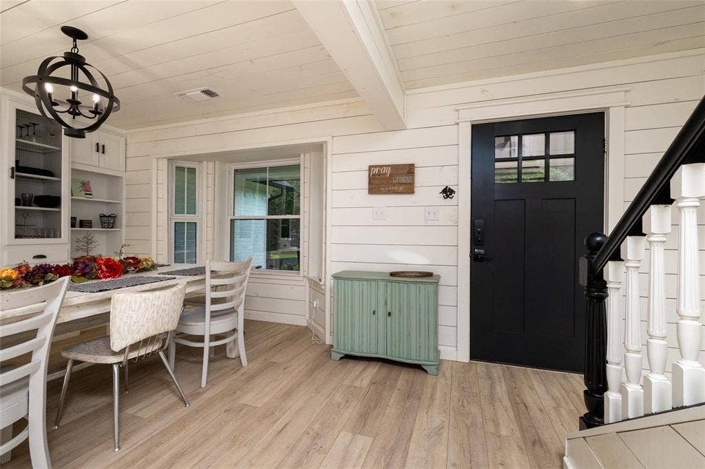Front door, formal dining, and stairs