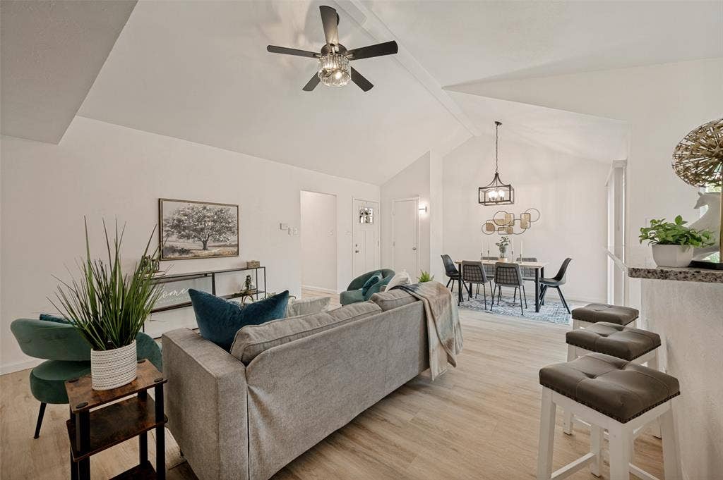 412 Pogue Street, Cedar Hill, TX 75104 Vaulted ceilings throughout the open-concept living area and dining room