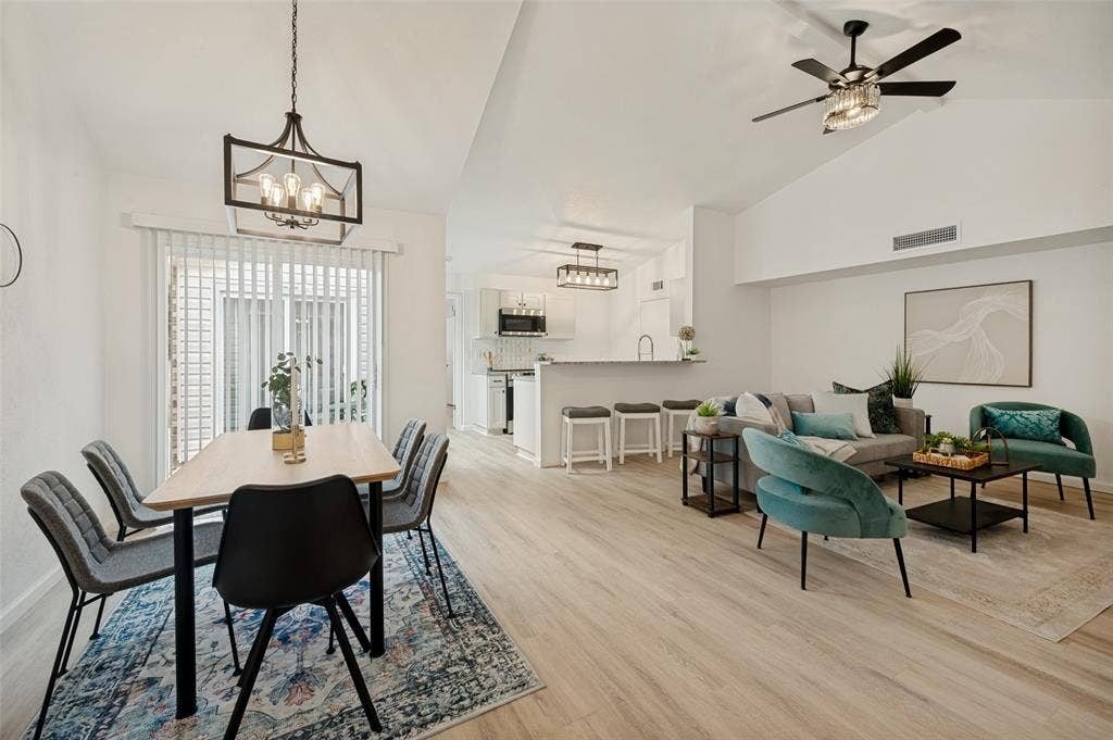 412 Pogue Street, Cedar Hill, TX 75104 Open concept living area featuring vaulted ceilings, wood-finish flooring, and recessed lighting