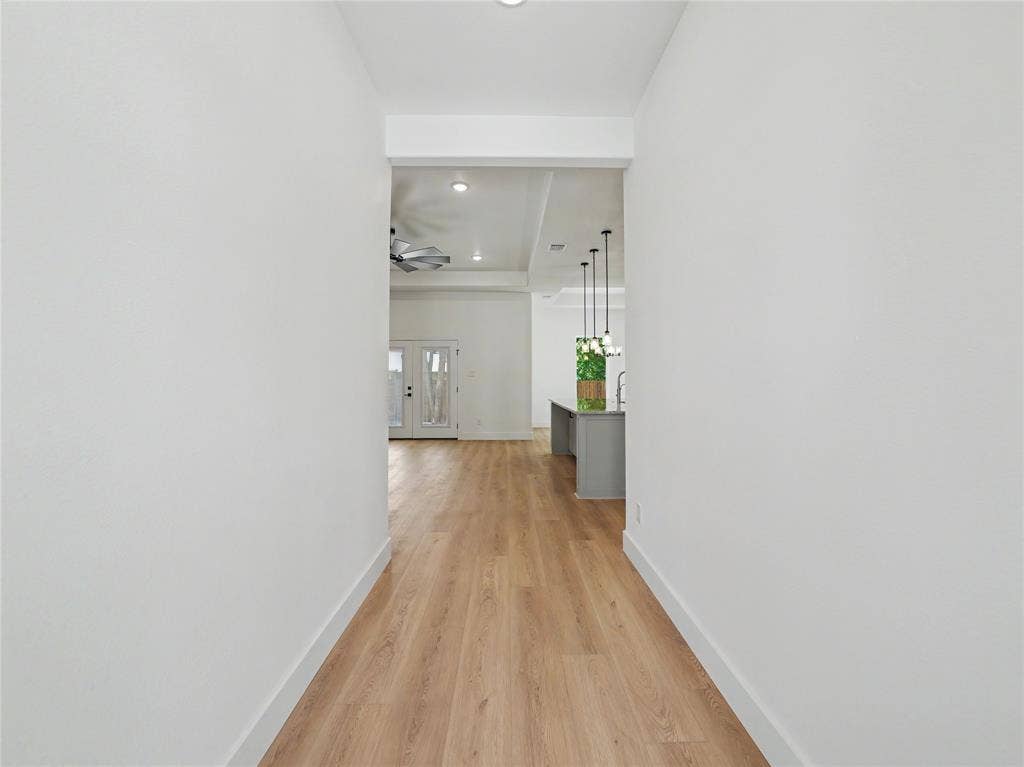 113 Dennis Drive, Azle, TX 76020 Hallway entry featuring wood-finish flooring, white walls, and a recessed ceiling light