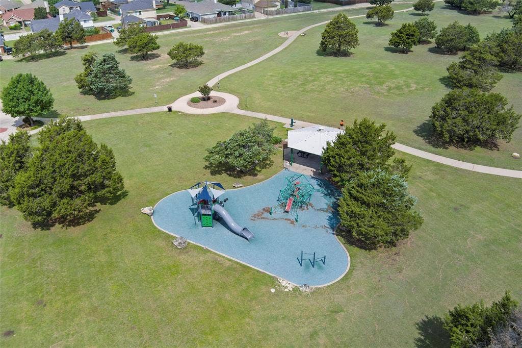 Aerial view of residential area featuring a community park