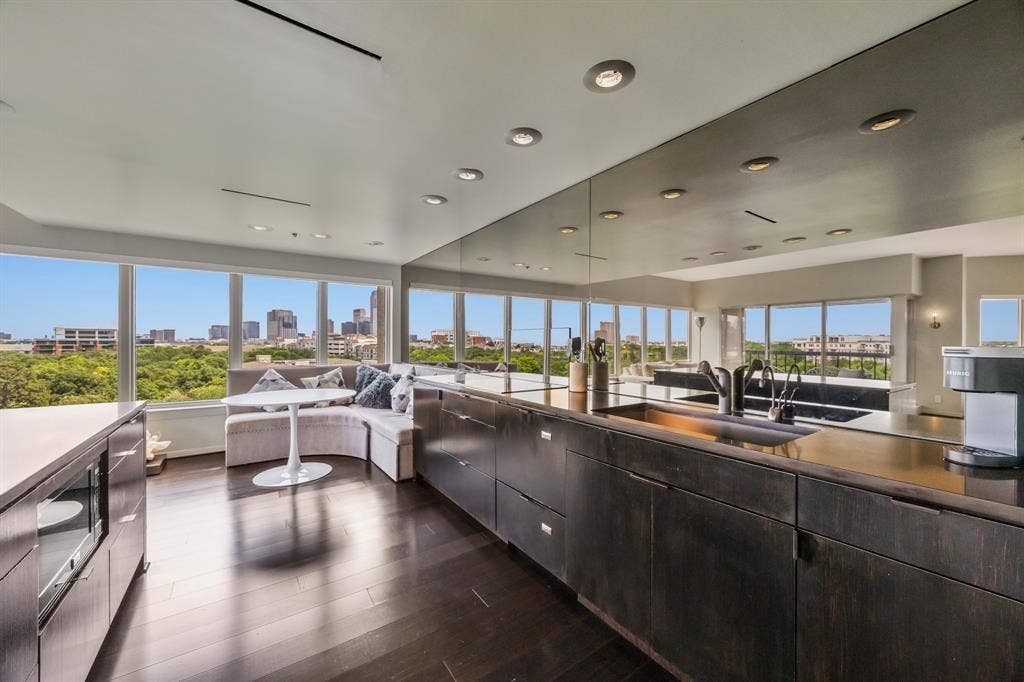 3030 Mckinney Avenue, #701, Dallas, TX 75204 Mirrored walls and recessed lighting add a polished touch.